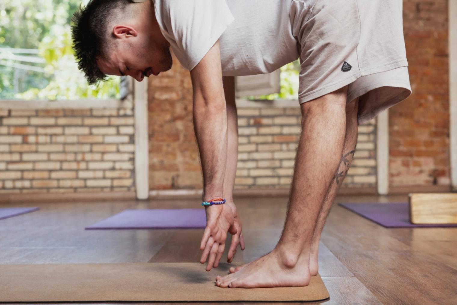 Gymnast holding a balance pose showing full body alignment during a session